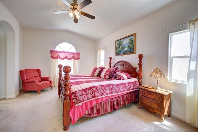 932 Provance Ave, Santa Maria, CA 93458 - bedroom featuring multiple windows, light carpet, lofted ceiling, and arched walkways