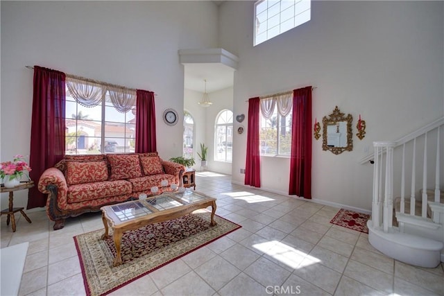 932 Provance Ave, Santa Maria, CA 93458 - tiled living area with a high ceiling and stairway