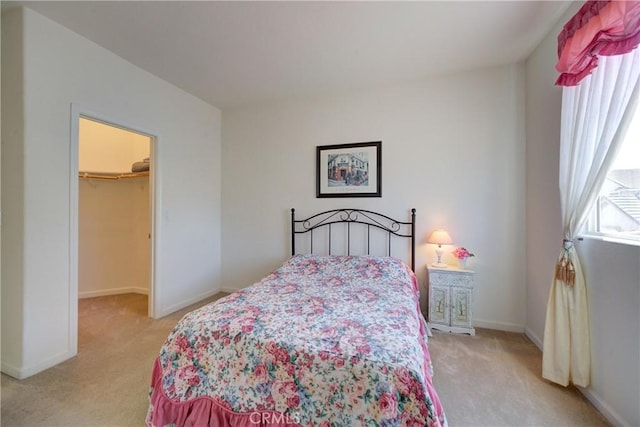 932 Provance Ave, Santa Maria, CA 93458 - bedroom featuring light carpet, a spacious closet, and baseboards