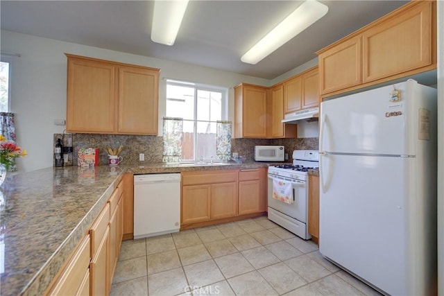 932 Provance Ave, Santa Maria, CA 93458 - kitchen featuring white appliances, under cabinet range hood, light brown cabinetry, and tasteful backsplash