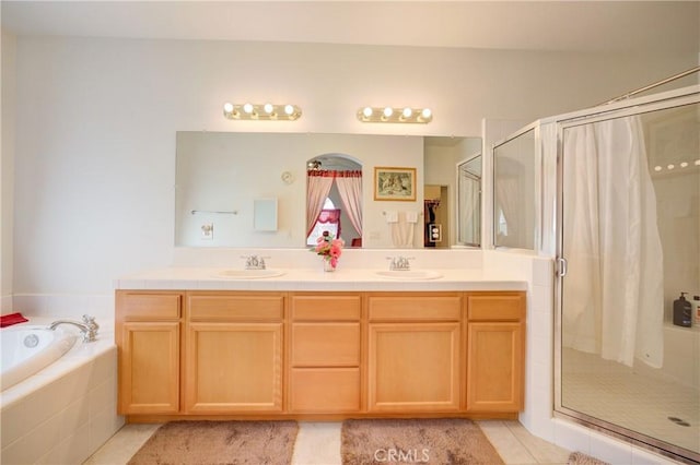 932 Provance Ave, Santa Maria, CA 93458 - bathroom featuring tile patterned flooring, a stall shower, a bath, and double vanity