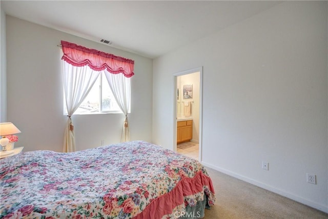 932 Provance Ave, Santa Maria, CA 93458 - bedroom featuring light colored carpet, baseboards, and connected bathroom
