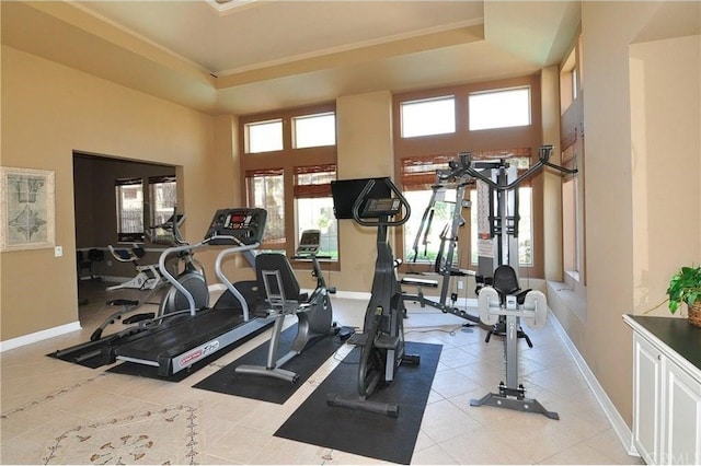 22681 Oakgrove Unit 536, Aliso Viejo, CA 92656 - exercise room with baseboards and light tile patterned flooring