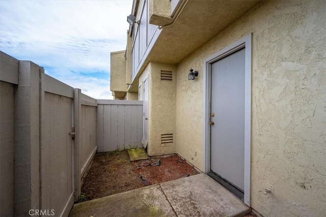 1213 W Cypress Ave Unit D, Lompoc, CA 93436 - view of exterior entry with stucco siding