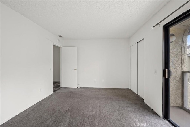 1213 W Cypress Ave Unit D, Lompoc, CA 93436 - spare room featuring a textured ceiling and carpet