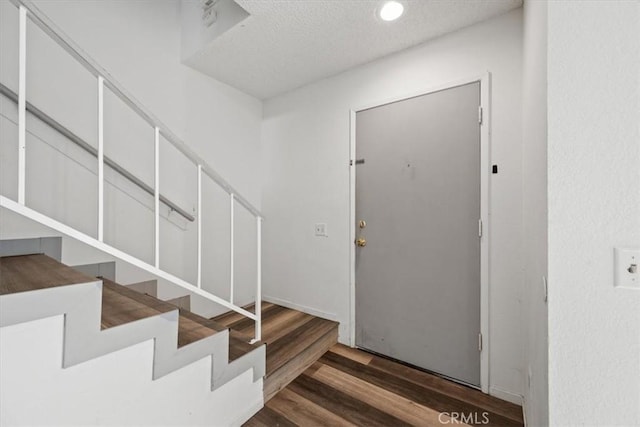 1213 W Cypress Ave Unit D, Lompoc, CA 93436 - entryway featuring wood finished floors, a textured ceiling, and recessed lighting