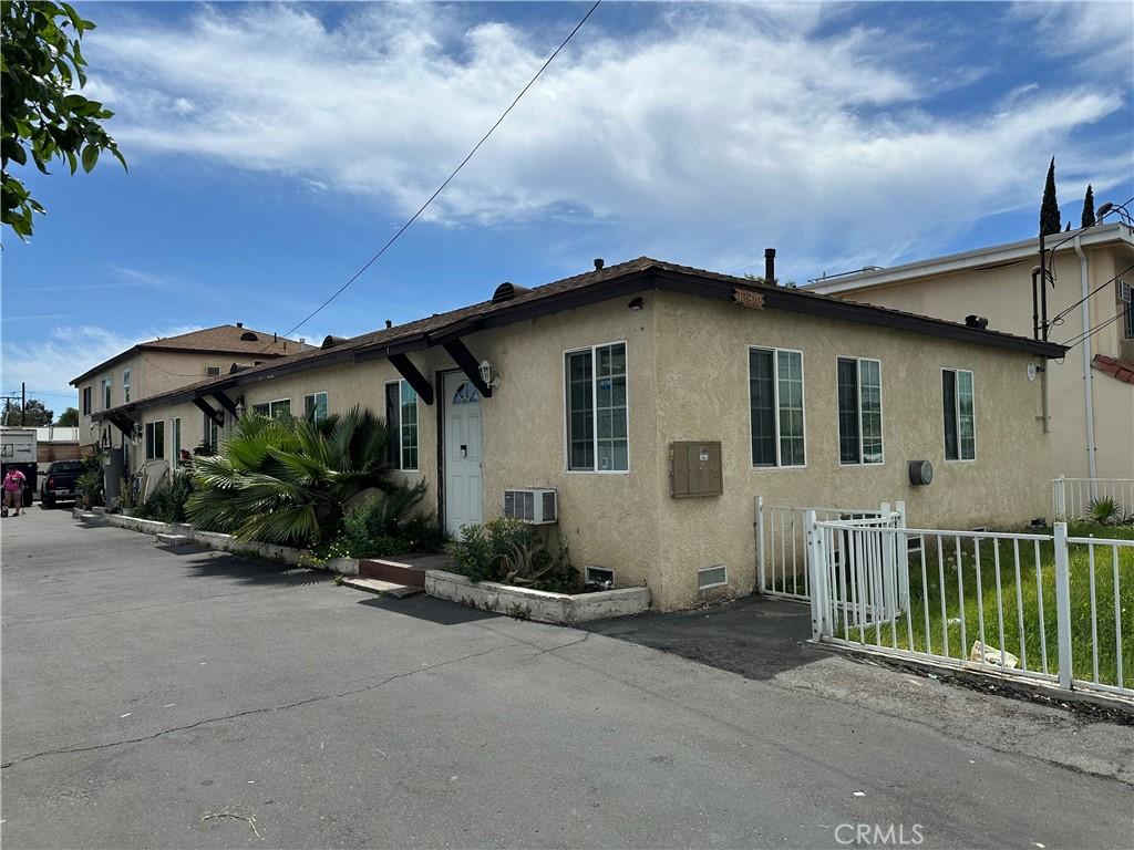 13810 Sherman Way, Van Nuys, CA 91405 - view of home's exterior with stucco siding