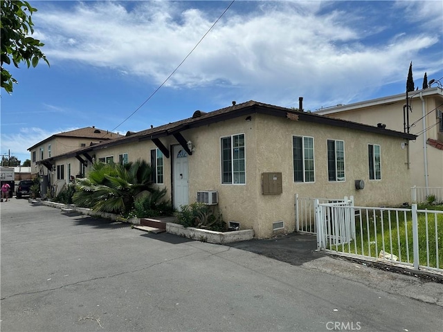 13810 Sherman Way, Van Nuys, CA 91405 - view of home's exterior with stucco siding