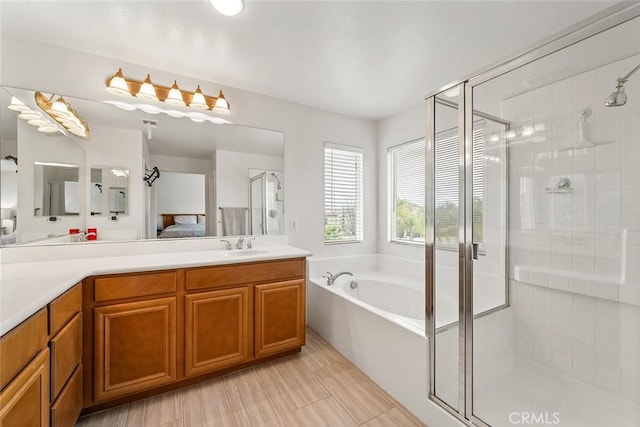 32768 Westport Way, Winchester, CA 92596 - full bath featuring a garden tub, vanity, and a stall shower