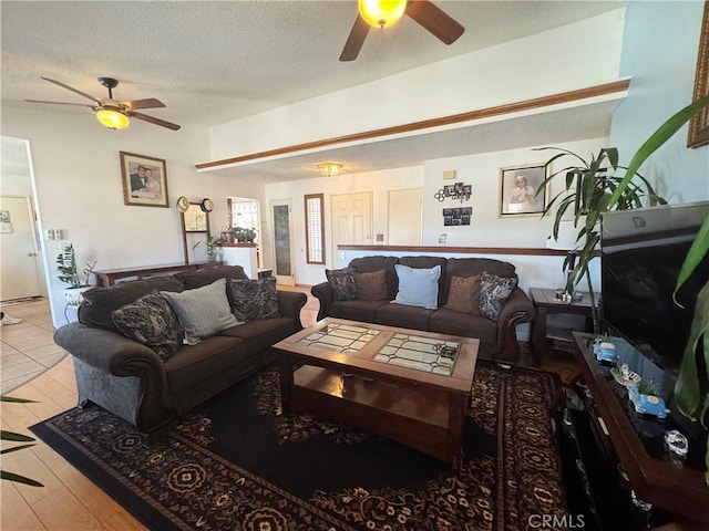 7446 Bangor Ave, Hesperia, CA 92345 - living room with ceiling fan, a textured ceiling, and wood finished floors