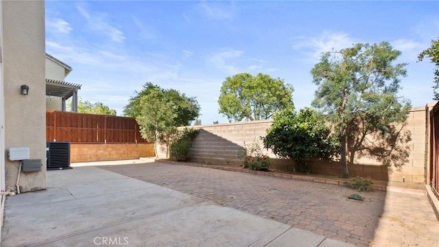 77 Crocus St, Redlands, CA 92373 - fenced backyard featuring a patio, a pergola, and central air condition unit