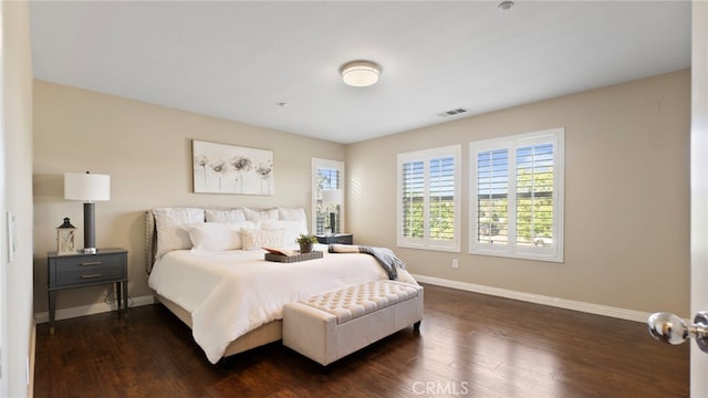 77 Crocus St, Redlands, CA 92373 - bedroom featuring baseboards and dark wood-type flooring