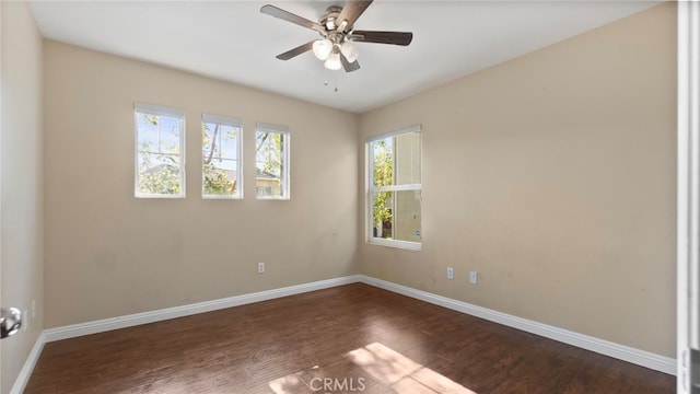 77 Crocus St, Redlands, CA 92373 - spare room featuring baseboards, dark wood finished floors, and ceiling fan