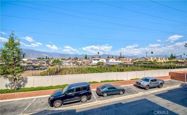 713 S Azusa Ave Unit A, Azusa, CA 91702 - uncovered parking lot featuring a residential view and a mountain view