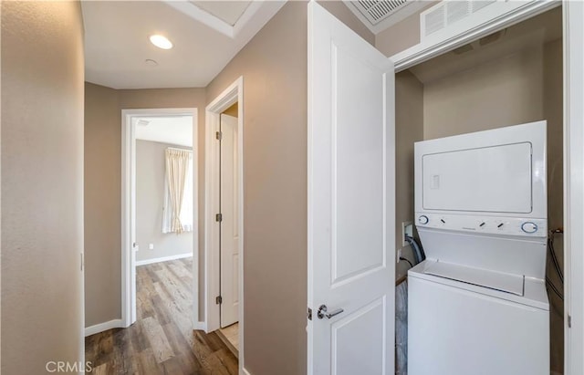 713 S Azusa Ave Unit A, Azusa, CA 91702 - laundry area with stacked washer / dryer, wood finished floors, and recessed lighting