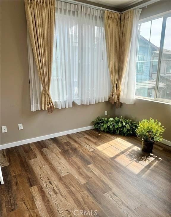 713 S Azusa Ave Unit A, Azusa, CA 91702 - spare room featuring wood finished floors