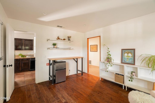 12841 Tree Ranch Rd, Ojai, CA 93023 - kitchen featuring fridge, dark wood-type flooring, dark brown cabinets, open shelves, and light countertops