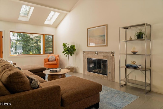 12841 Tree Ranch Rd, Ojai, CA 93023 - living room with a tile fireplace, a skylight, tile patterned flooring, and high vaulted ceiling