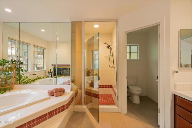 12841 Tree Ranch Rd, Ojai, CA 93023 - bathroom featuring a stall shower, a garden tub, vanity, toilet, and tile patterned floors