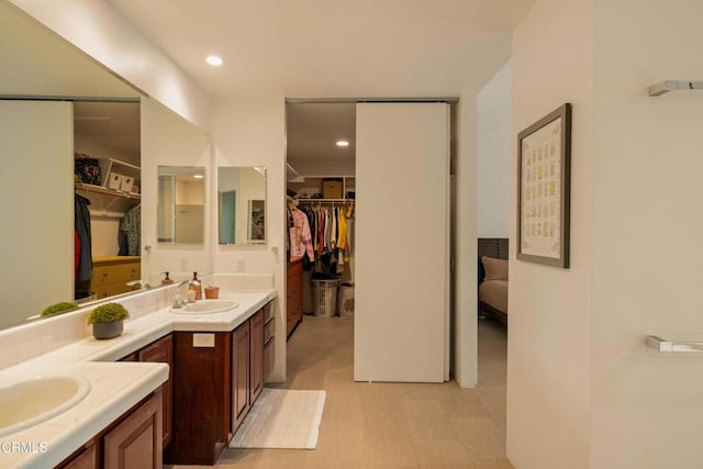 12841 Tree Ranch Rd, Ojai, CA 93023 - full bathroom featuring vanity, a walk in closet, and recessed lighting