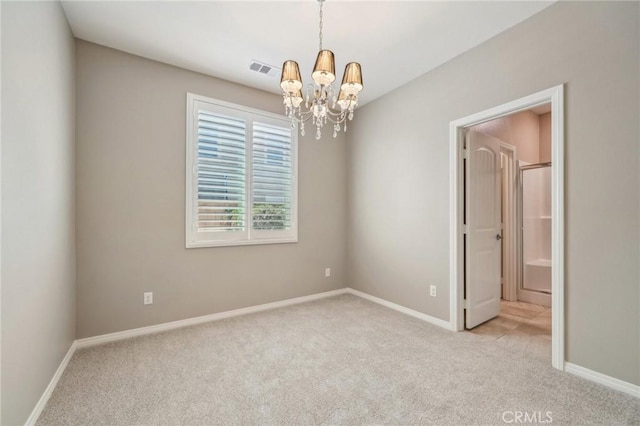 6125 Coopers Hawk Dr, Jurupa Valley, CA 91752 - spare room featuring light carpet, a chandelier, and baseboards