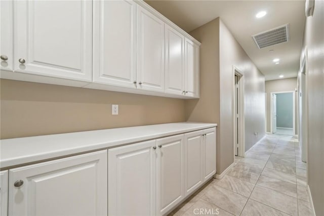 6125 Coopers Hawk Dr, Jurupa Valley, CA 91752 - corridor with baseboards, recessed lighting, and light marble finish floors