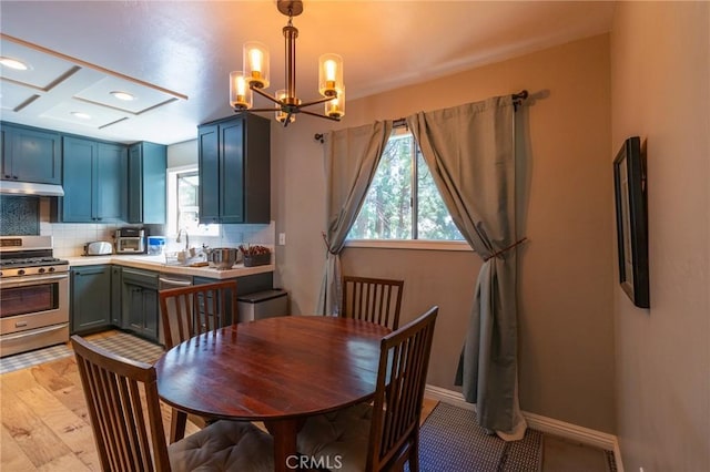31045 Valley Oak Dr, Running Springs, CA 92382 - dining room featuring a chandelier, recessed lighting, and baseboards