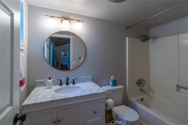 31045 Valley Oak Dr, Running Springs, CA 92382 - bathroom with vanity, toilet, and washtub / shower combination