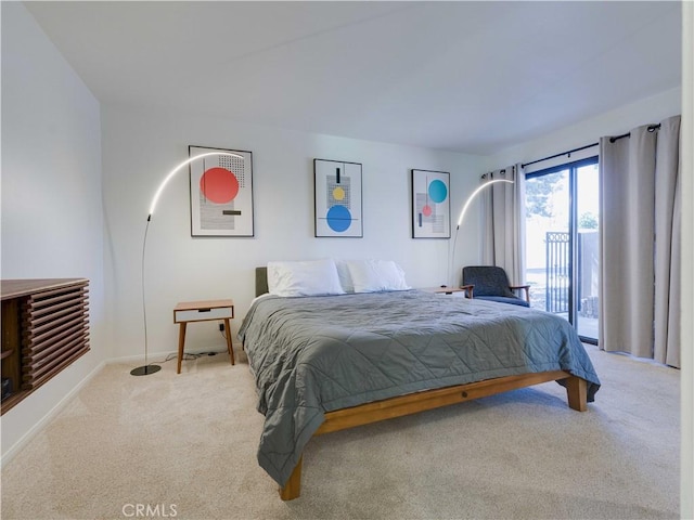 316 Forest Hills Dr, Rancho Mirage, CA 92270 - carpeted bedroom with access to outside and baseboards
