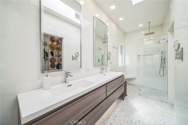 528 San Andres Dr, Solana Beach, CA 92075 - full bathroom with a walk in shower, double vanity, speckle patterned floor, and recessed lighting
