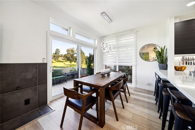 528 San Andres Dr, Solana Beach, CA 92075 - dining space with light wood finished floors and a chandelier
