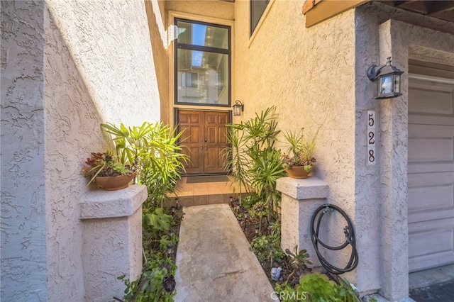 528 San Andres Dr, Solana Beach, CA 92075 - view of exterior entry featuring stucco siding