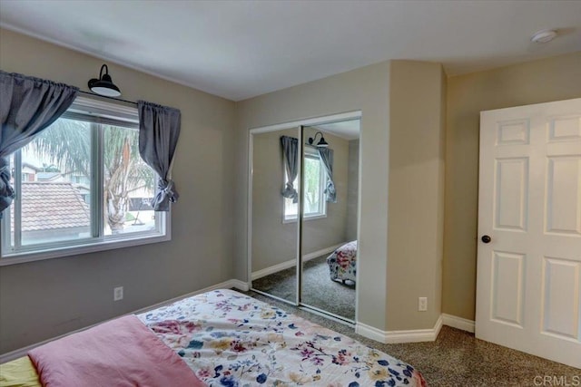 29567 Castlewood Dr, Menifee, CA 92584 - carpeted bedroom featuring a closet and baseboards