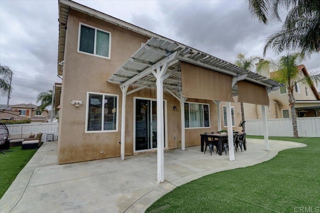 29567 Castlewood Dr, Menifee, CA 92584 - back of property with stucco siding, a patio, and an outdoor living space