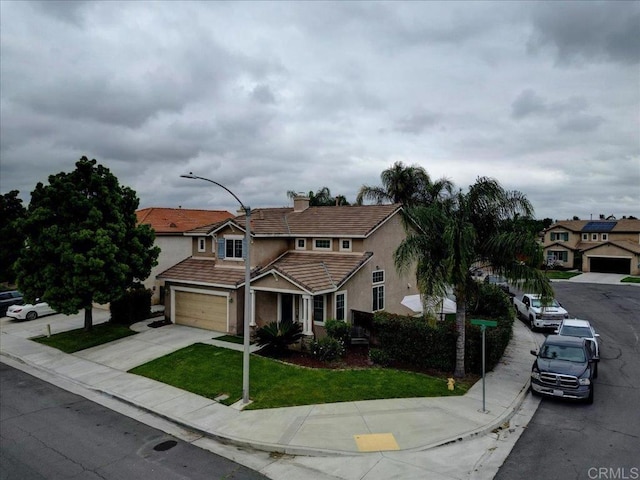 29567 Castlewood Dr, Menifee, CA 92584 - view of front of house featuring stucco siding, driveway, a tiled roof, a garage, and a front yard