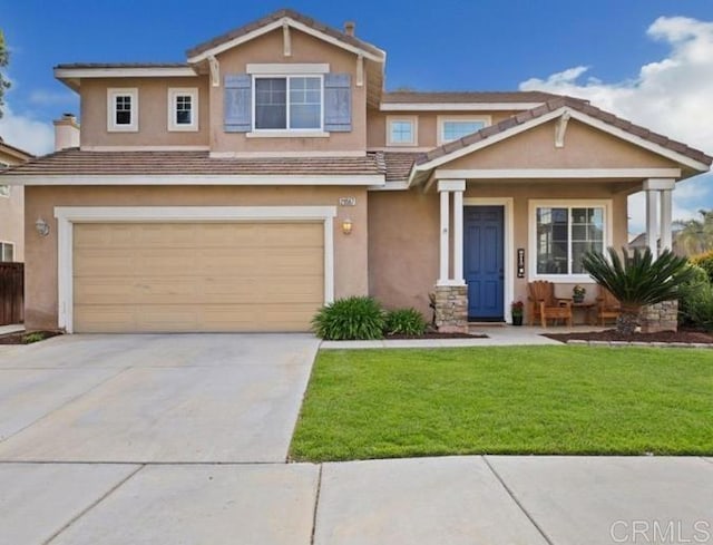 29567 Castlewood Dr, Menifee, CA 92584 - view of front of house with an attached garage, a front yard, and stucco siding