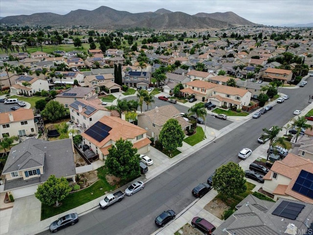 29567 Castlewood Dr, Menifee, CA 92584 - aerial overview of property's location with a mountainous background and nearby suburban area