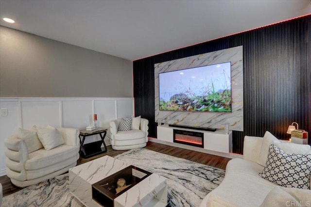 29567 Castlewood Dr, Menifee, CA 92584 - living room featuring wood finished floors, wainscoting, and recessed lighting