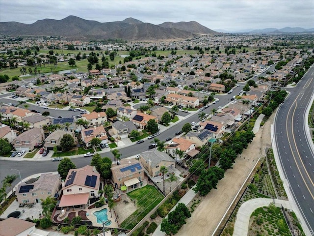 29567 Castlewood Dr, Menifee, CA 92584 - aerial view of property's location featuring a mountain backdrop and nearby suburban area
