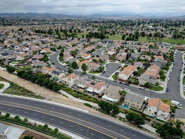 29567 Castlewood Dr, Menifee, CA 92584 - aerial overview of property's location featuring a mountain backdrop and nearby suburban area