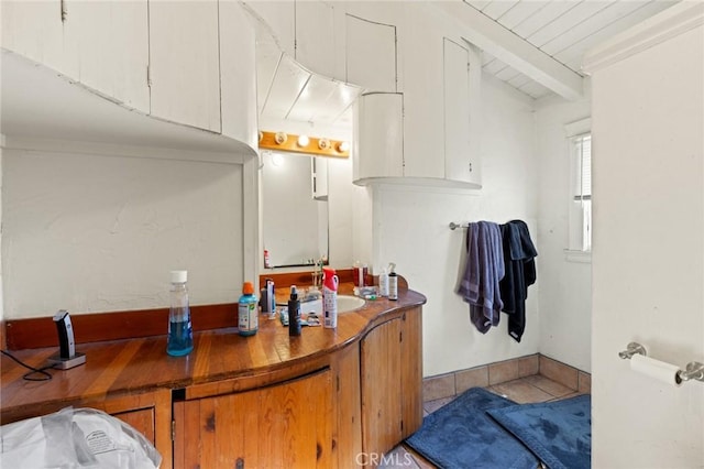 831 Rio Chico Way, Chico, CA 95928 - bathroom with tile patterned floors, wood ceiling with exposed beams, and vanity
