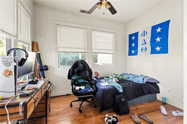 831 Rio Chico Way, Chico, CA 95928 - bedroom featuring wood finished floors, baseboards, and a ceiling fan