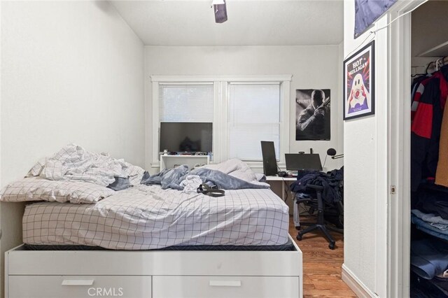 831 Rio Chico Way, Chico, CA 95928 - bedroom with wood finished floors, a desk, and ceiling fan