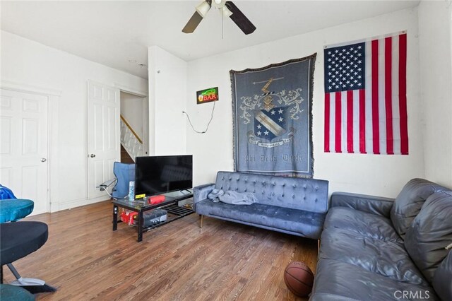 831 Rio Chico Way, Chico, CA 95928 - living area featuring wood finished floors, a ceiling fan, and stairs