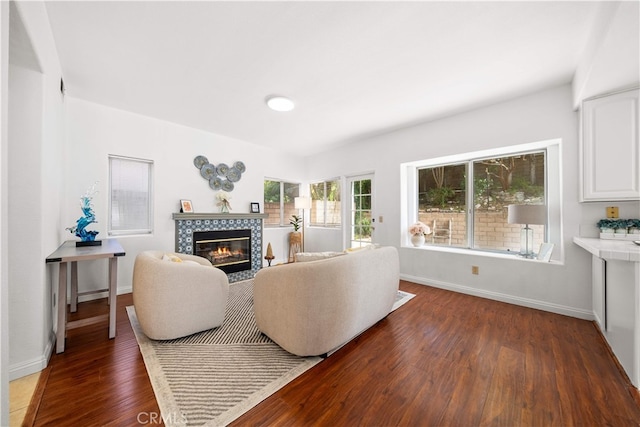 10274 Corkwood Ct, Rancho Cucamonga, CA 91737 - living area featuring wood finished floors, a fireplace, and baseboards