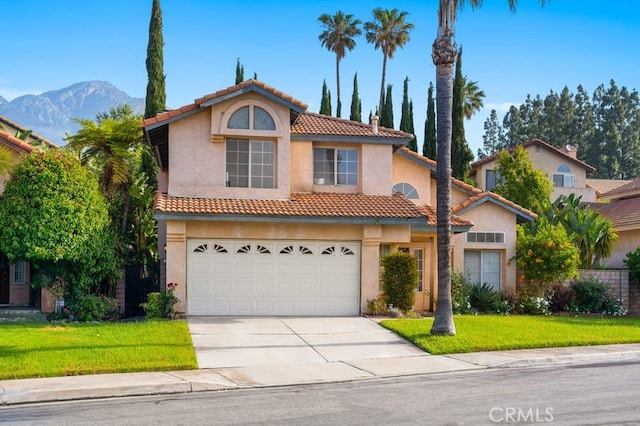 10274 Corkwood Ct, Rancho Cucamonga, CA 91737 - view of front of home featuring driveway, stucco siding, a front lawn, a tile roof, and a garage