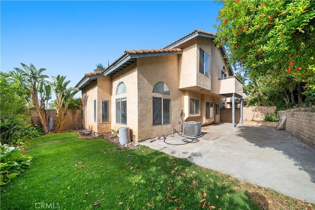 10274 Corkwood Ct, Rancho Cucamonga, CA 91737 - back of property featuring stucco siding, a patio, cooling unit, and a tile roof