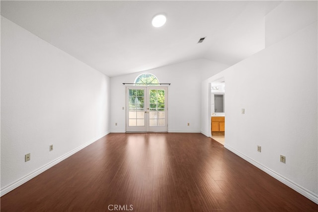 10274 Corkwood Ct, Rancho Cucamonga, CA 91737 - unfurnished living room with lofted ceiling, dark wood finished floors, baseboards, and french doors