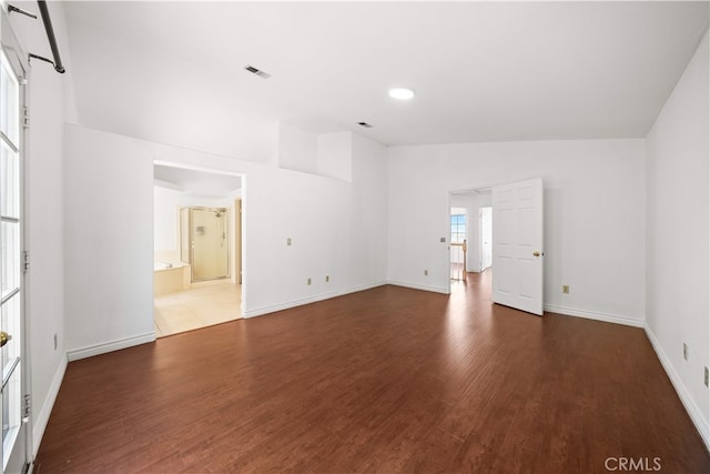 10274 Corkwood Ct, Rancho Cucamonga, CA 91737 - empty room with wood finished floors, baseboards, vaulted ceiling, and recessed lighting