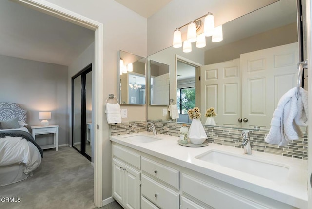 2320 Mountain Ave, La Crescenta, CA 91214 - full bath featuring a chandelier, tasteful backsplash, double vanity, and baseboards
